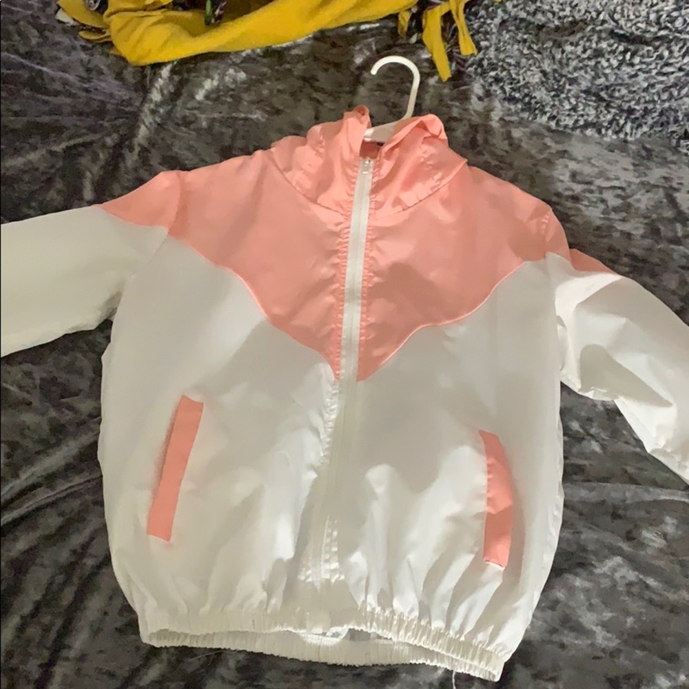 Pink and white wind breaker